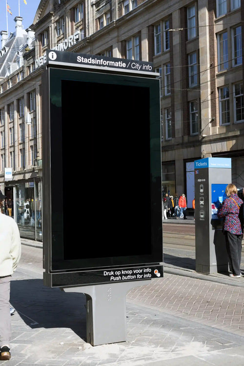 Amsterdam city light poster mockup close-up near Central Station and Dam Square with brick wall background.