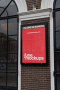 City light poster mockup in front of De Kleine Komedie theater in Amsterdam with bold red poster design.