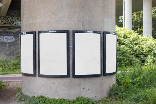 Blank background curved poster mockups on round concrete pillar in Amsterdam, realistic outdoor billboard display under bridge architecture, high resolution PSD template for custom advertising and branding design.