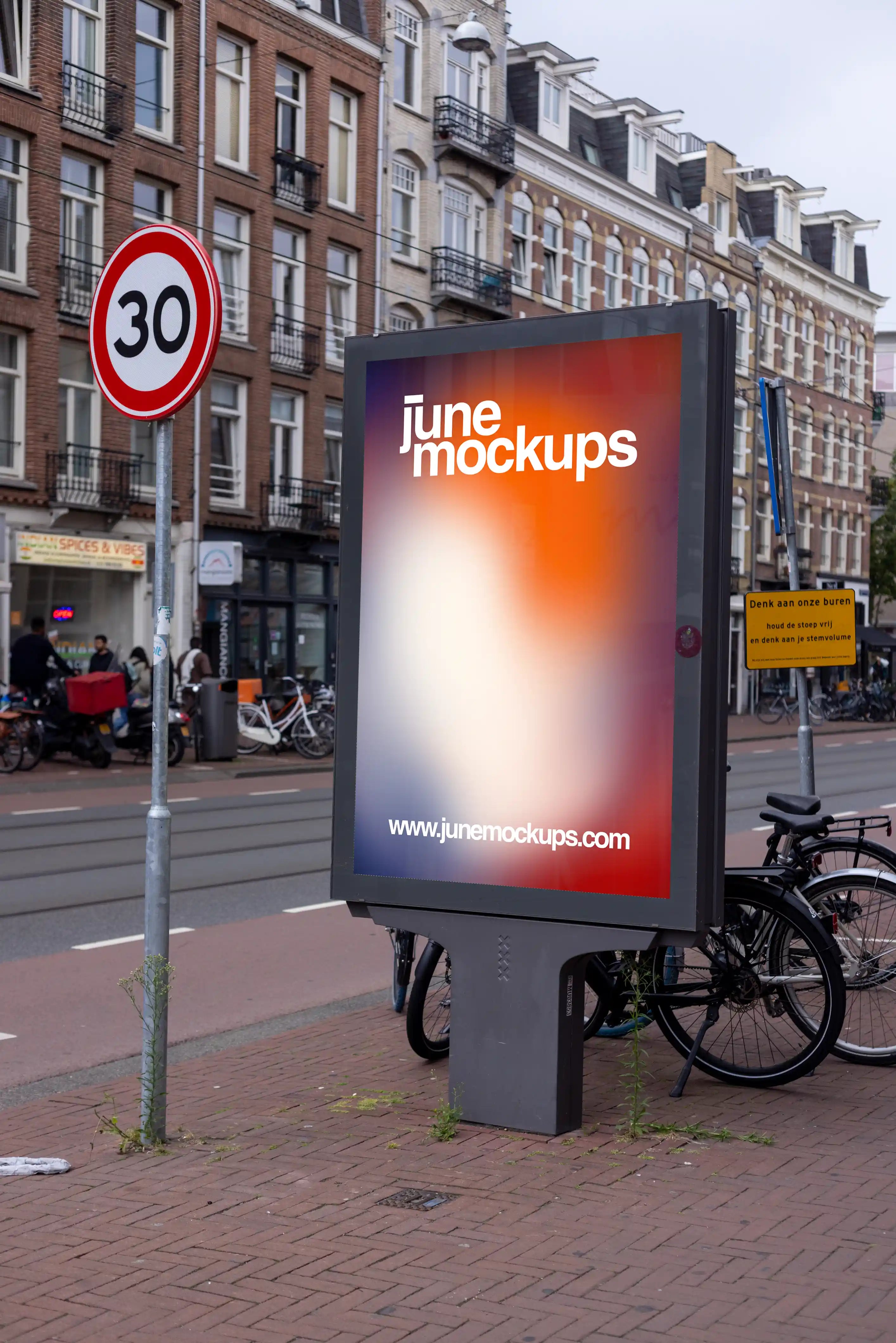 Amsterdam De Pijp city light poster mockup in a realistic urban street environment with bicycles, tram tracks and Dutch architecture in Amsterdam, Netherlands.
