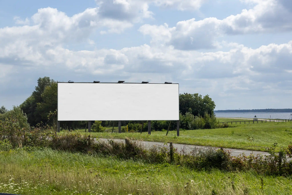 Blank background large landscape billboard mockup on highway near Amsterdam at Almeerderstrand overlooking the Markermeer, realistic Dutch roadside advertising display, high resolution PSD template for professional branding and marketing visuals.