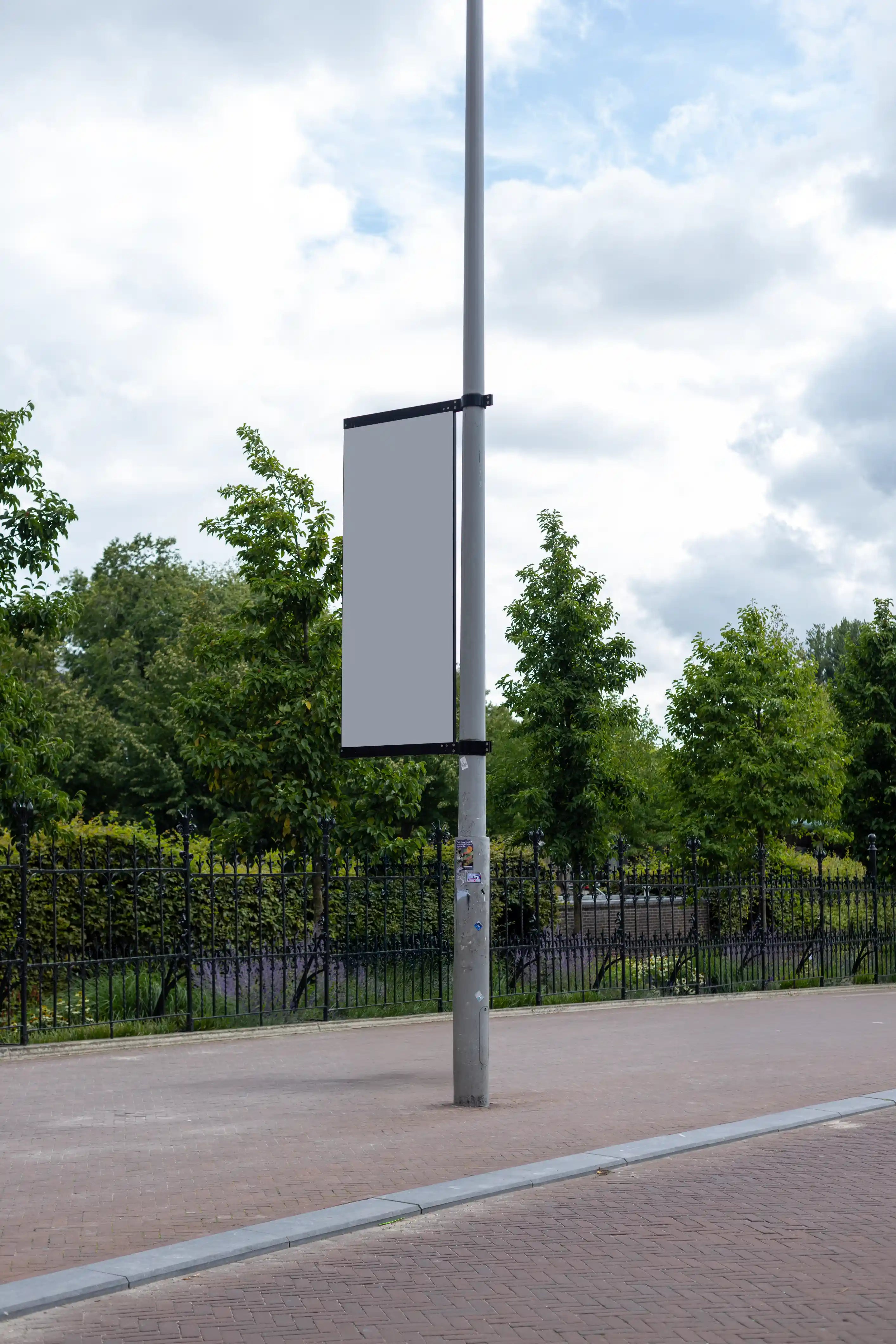 Blank background Amsterdam Rijksmuseum lamppost banner flag mockup in DIN format mounted on a streetlight in a realistic museum district environment in Amsterdam, Netherlands.