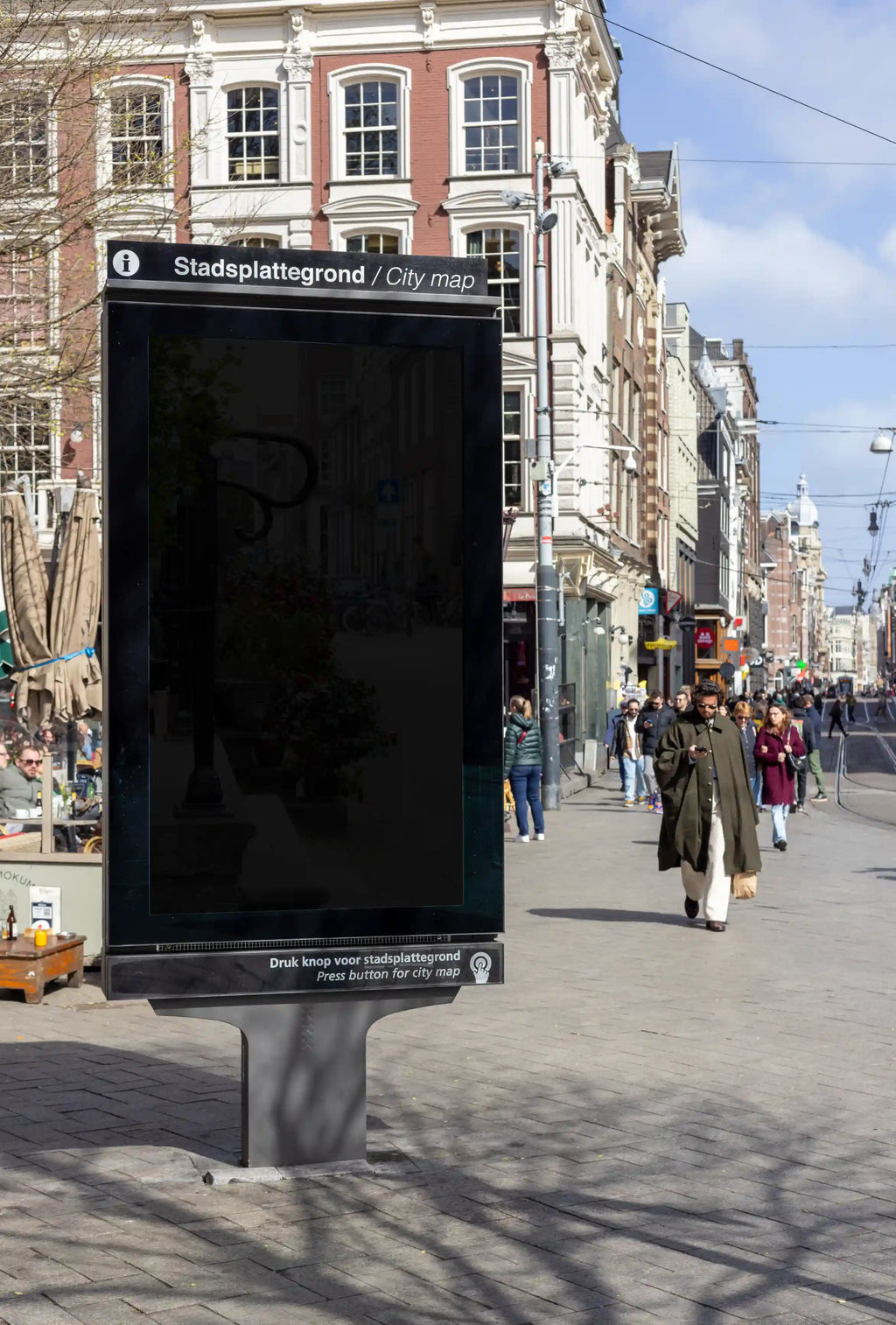 msterdam city light poster mockup near Schouwburg Theater, Leidseplein with busy street scene.