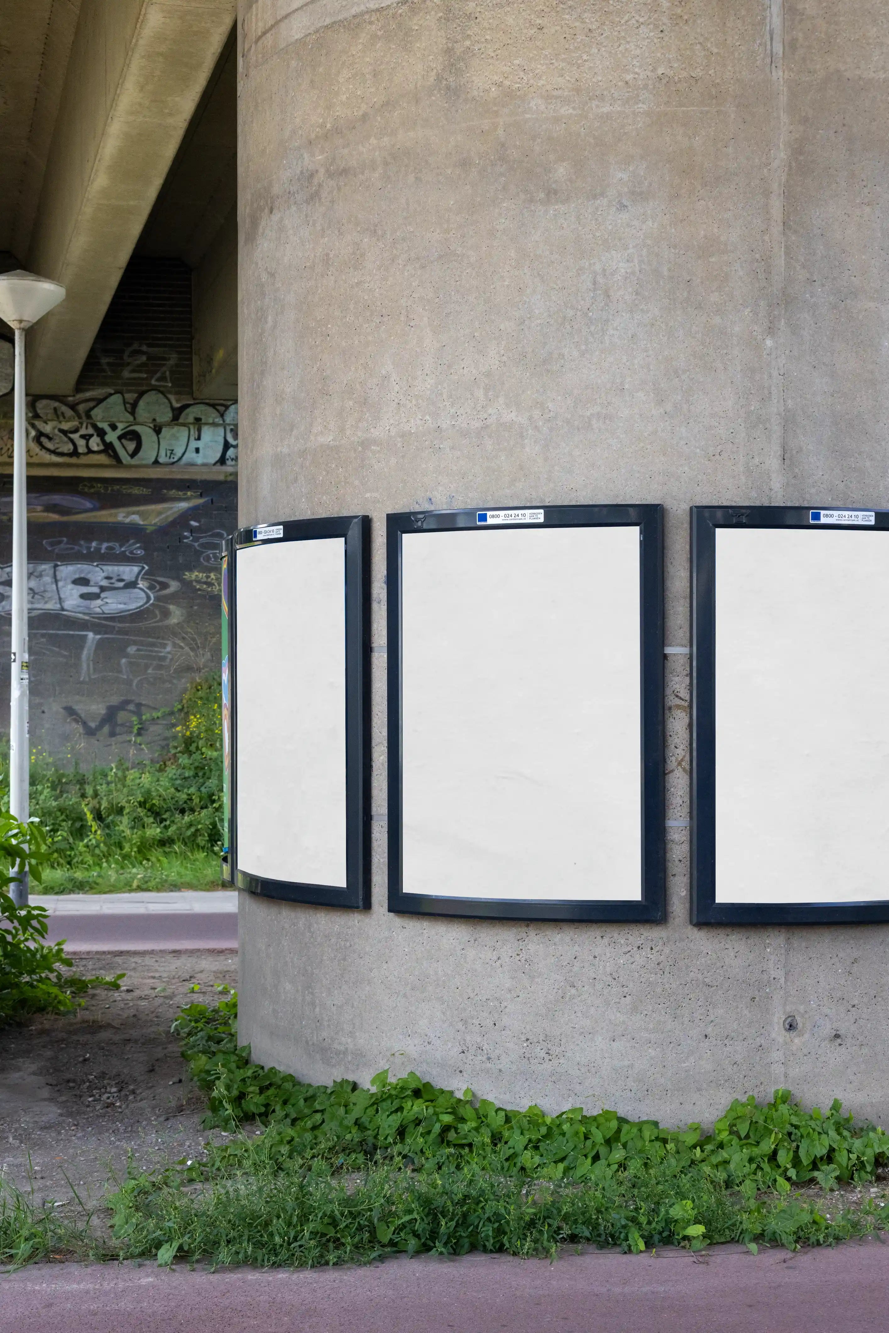 Blank background urban concrete pillar poster mockup in Amsterdam with realistic outdoor advertising frames, high resolution PSD template ideal for professional branding and campaign design presentation.