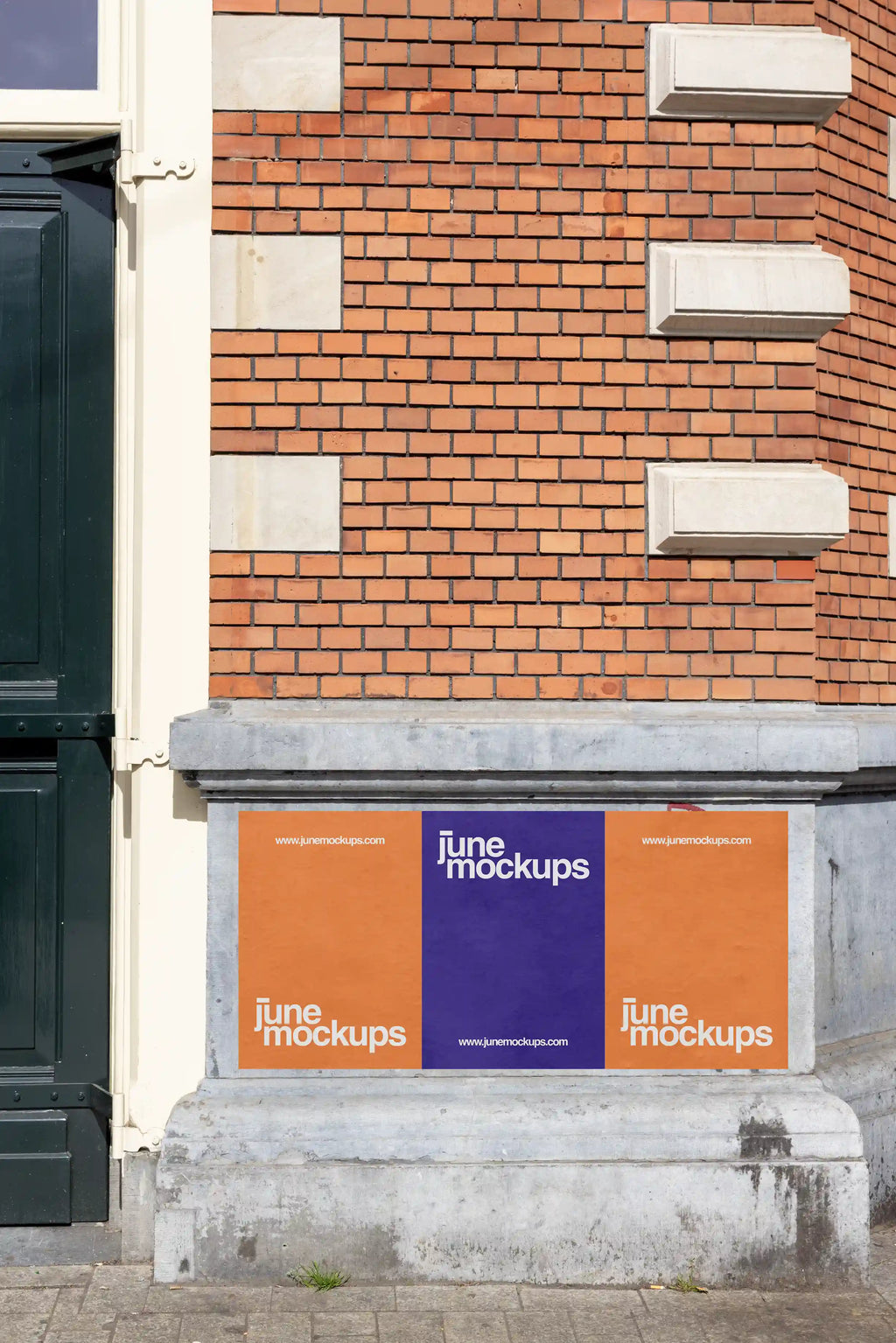 Amsterdam urban street poster mockup on a classic brick facade with three posters in orange and purple, perfect for realistic design presentations