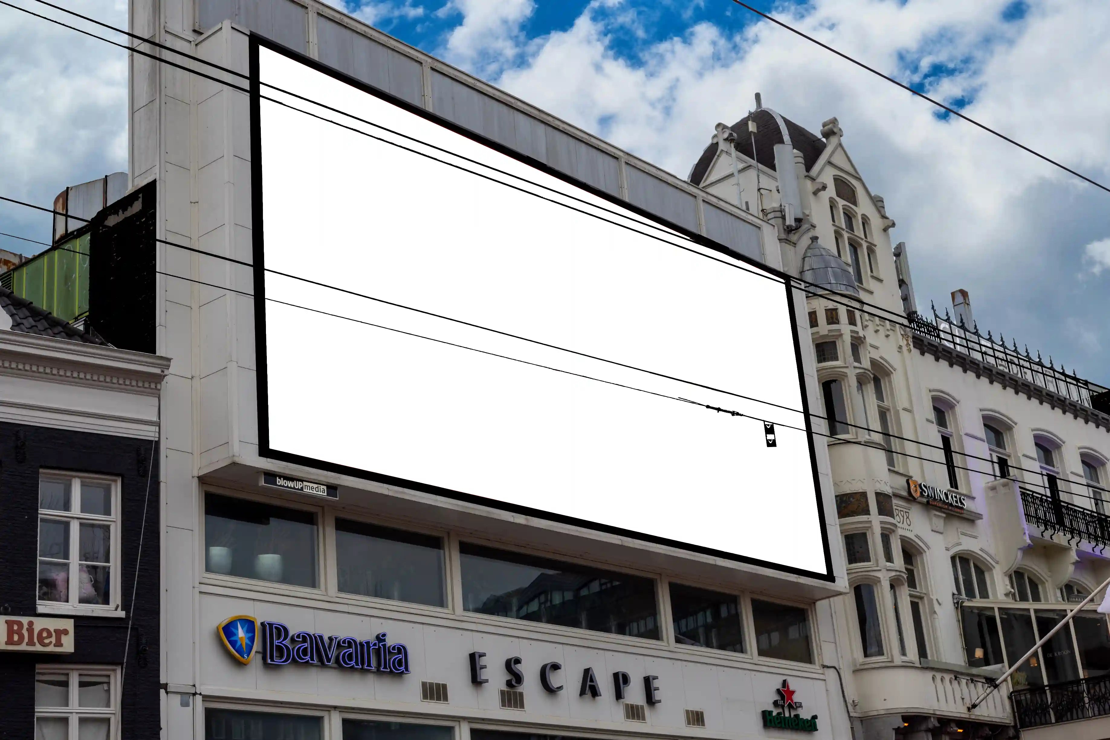 Large billboard mockup at Rembrandtplein in Amsterdam, located above Escape Club with red poster design.