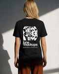 Female black t-shirt mockup with large back print design, photographed in natural sunlight with strong shadows and realistic fabric folds, perfect for streetwear apparel branding, merch designs, fashion campaigns and back print presentations.