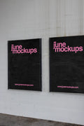 Realistic framed out of home poster mockup duo photographed in Basel, showing two black poster displays on a concrete wall with authentic paper texture, subtle shadows and urban advertising details, ideal for branding concepts, event posters, music artwork, street campaigns and professional poster design presentations.
