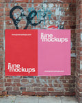 Blank poster mockup on a red brick wall with graffiti traces and natural lighting in Hamburg, Berlin, Hanover, Munich, Cologne. Perfect for inserting double poster designs, offering realistic texture, paper folds, and authentic outdoor atmosphere.