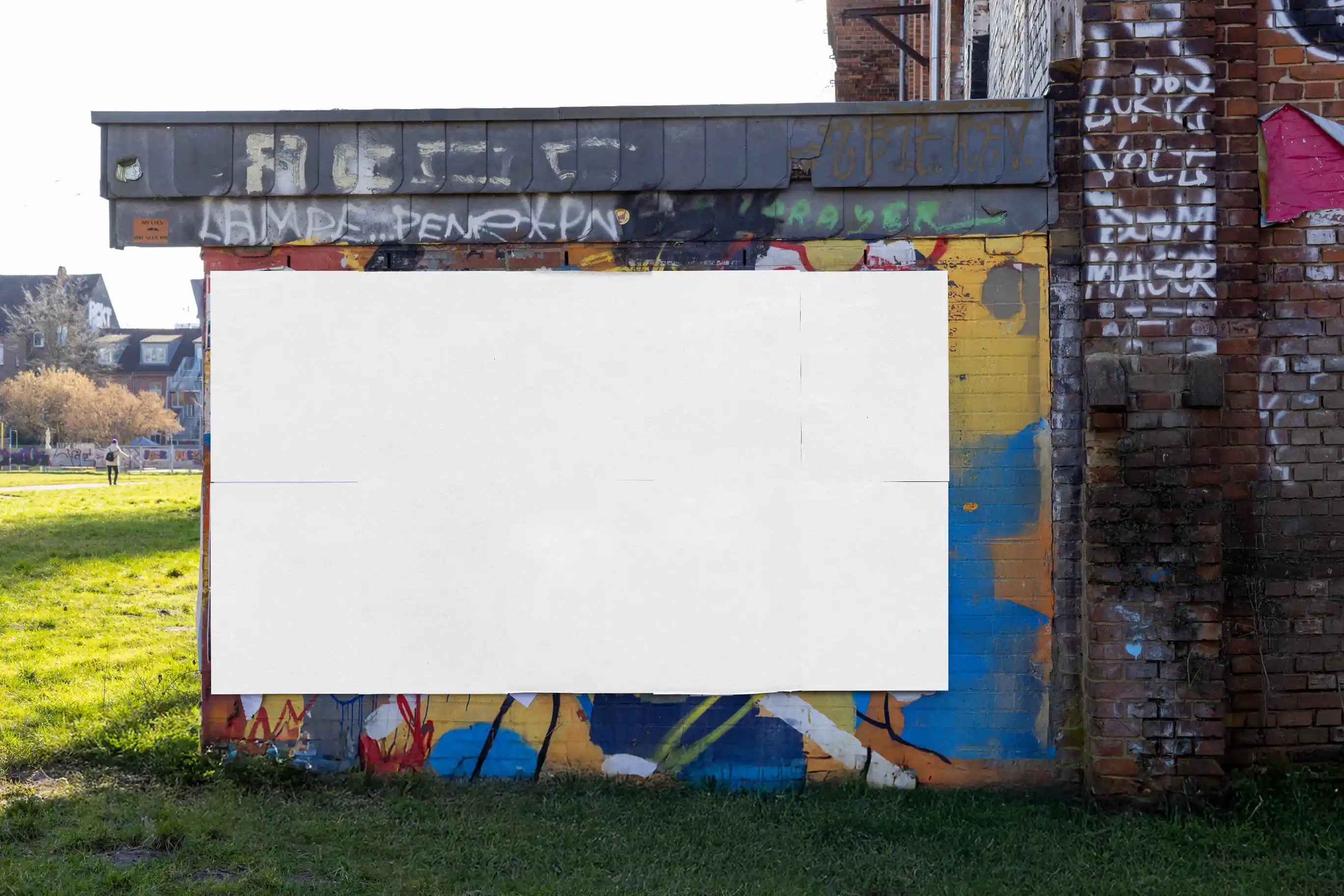 Blank wall mockup with realistic brick texture and graffiti elements shot in Hanover. Designed for placing multiple poster designs, showing natural light and urban imperfections for a professional yet authentic look.