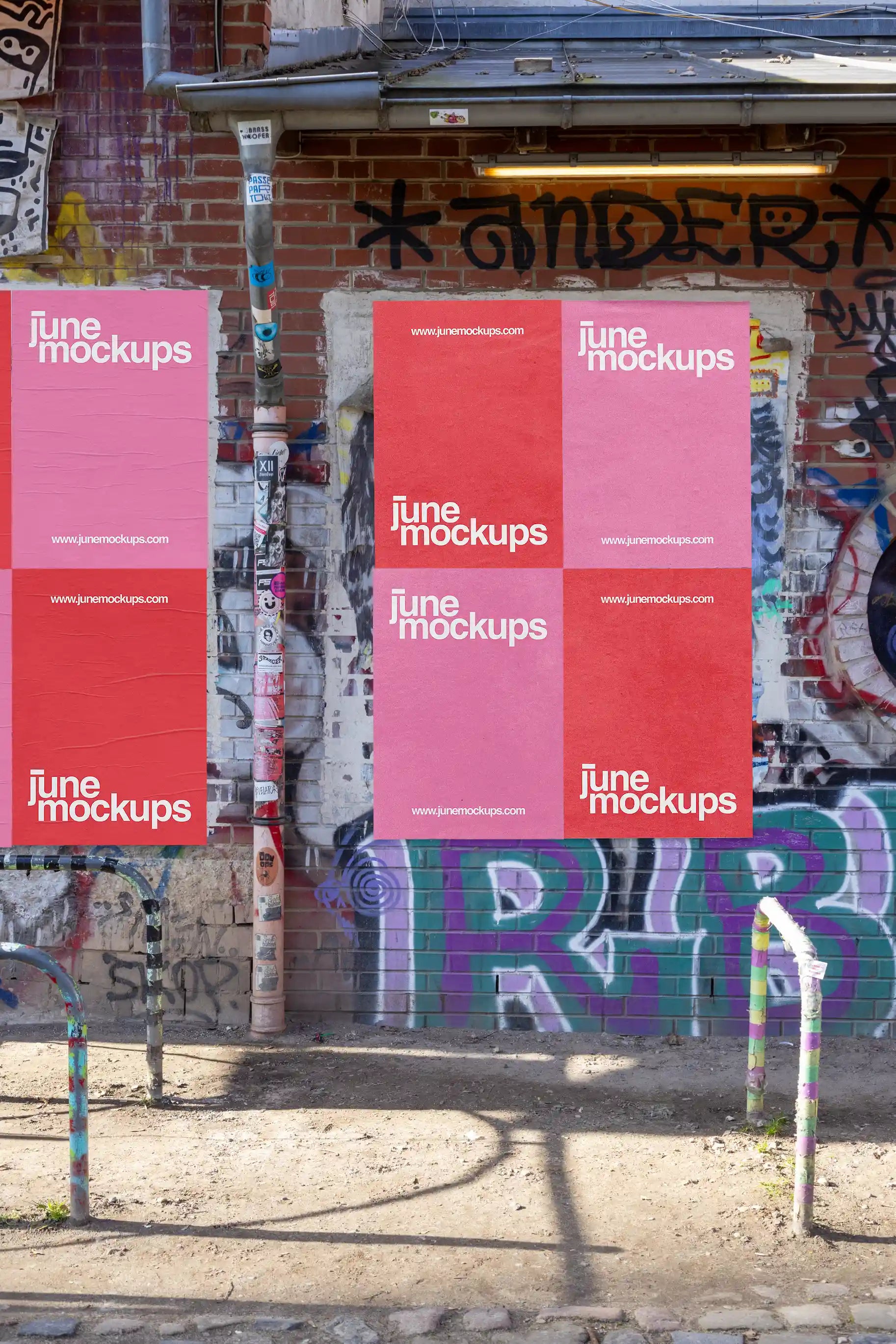 High-quality double poster mockup on a graffiti-covered brick wall in Hannover. Realistic daylight shadows, street textures, and paper creases make it perfect for showcasing music, art, or event poster designs in an authentic urban environment.
