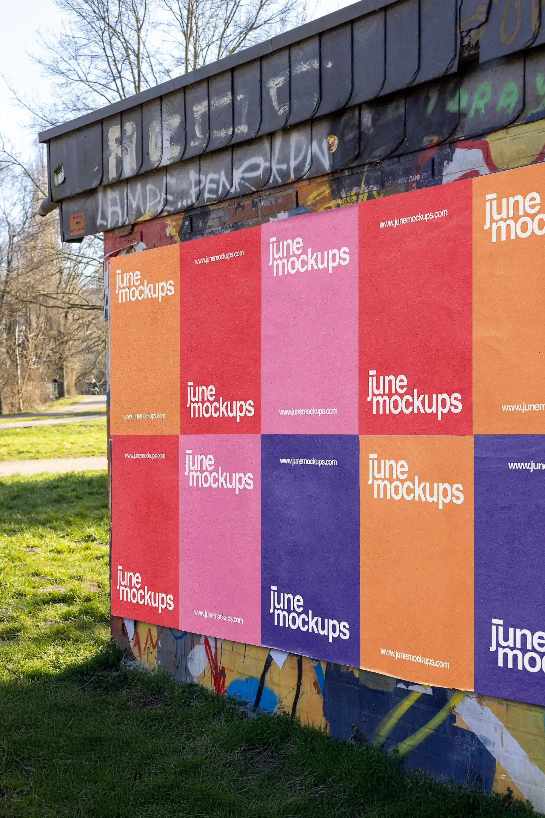 High-quality urban poster mockup showing multiple colorful pasted posters on a graffiti-covered wall in Hannover. Realistic street textures, daylight shadows, and detailed wall imperfections make it perfect for showcasing event, music, or art poster designs.