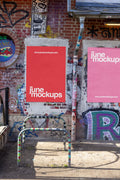 Single street poster mockup displayed on a brick wall with graffiti and stickers. Features natural sunlight, realistic shadows, and fine paper texture. Ideal for modern street art or cultural event design presentations.