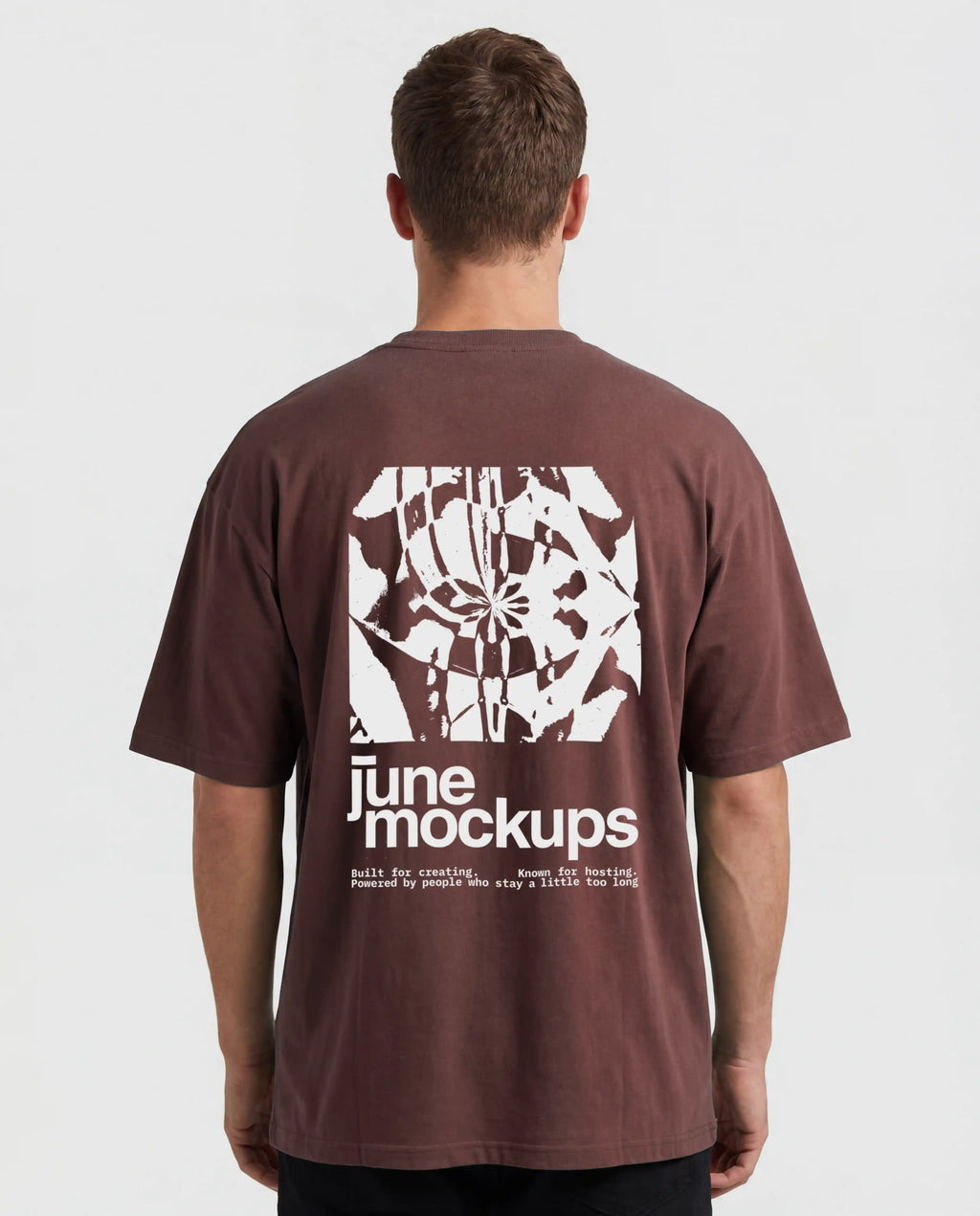 Male black t-shirt mockup from the back with large graphic print placement, clean studio background and realistic oversized fit, ideal for streetwear brands, back print designs, music merch, clothing labels and apparel mockup previews.