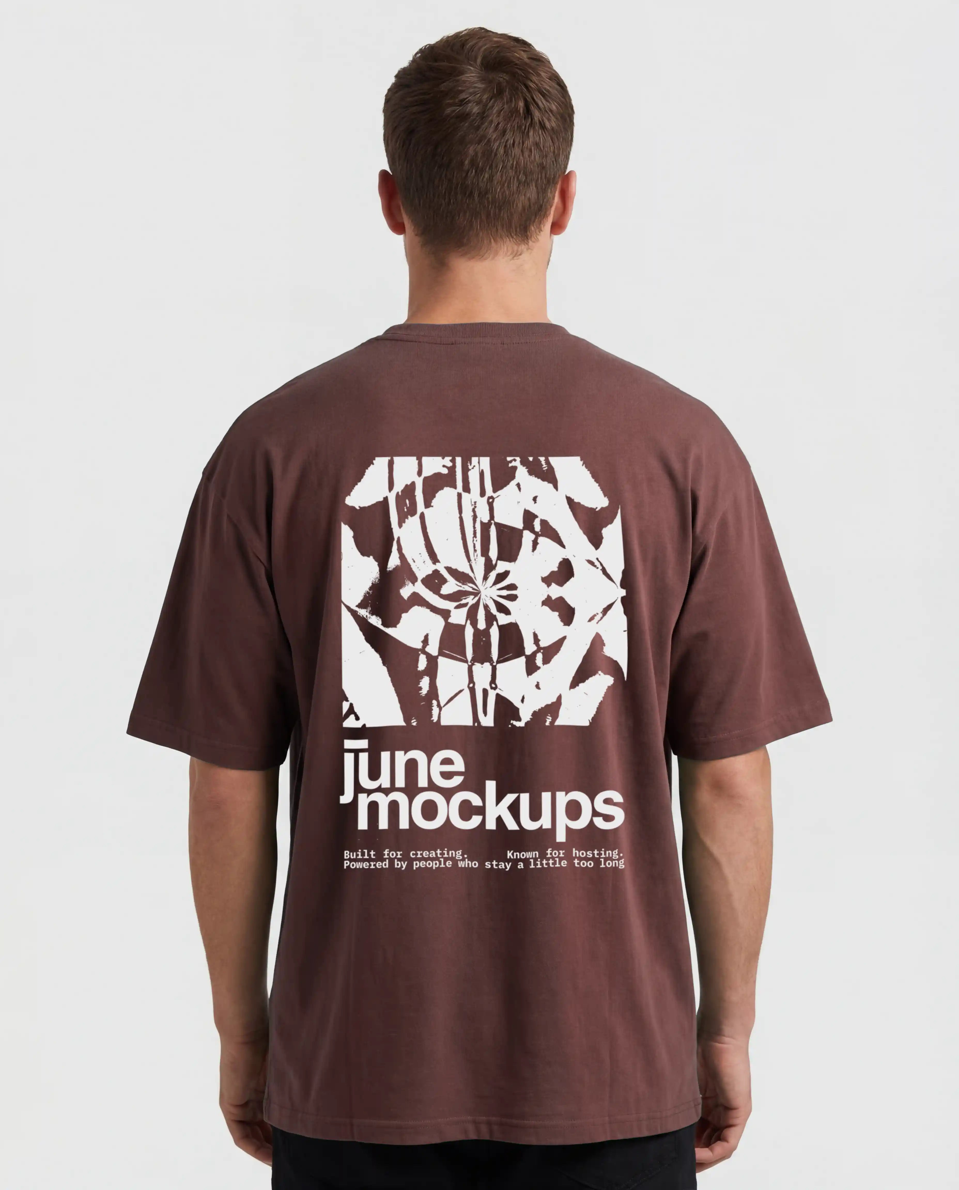 Male black t-shirt mockup from the back with large graphic print placement, clean studio background and realistic oversized fit, ideal for streetwear brands, back print designs, music merch, clothing labels and apparel mockup previews.