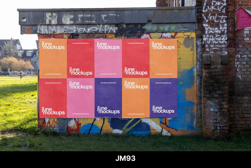 Multiple bright posters on a city wall near a park, surrounded by graffiti and natural light. Ideal for brands or designers who want to see their artwork in a real outdoor setting.