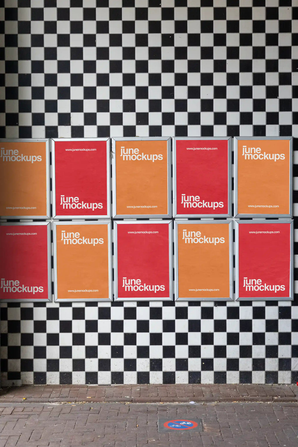 High-resolution poster grid mockup on a black-and-white checkerboard wall in Amsterdam Haarlemmerdijk, perfect for showcasing multiple poster designs in a real street setting.